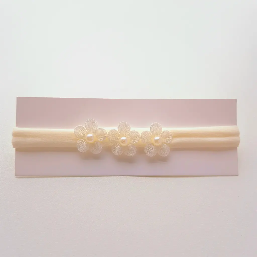 Faixinha de cabelo Florzinha